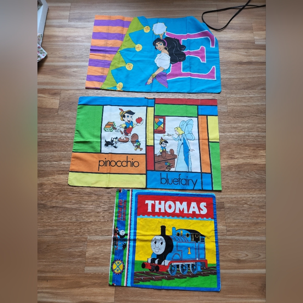 Vintage disney pillow cases and thomas the train